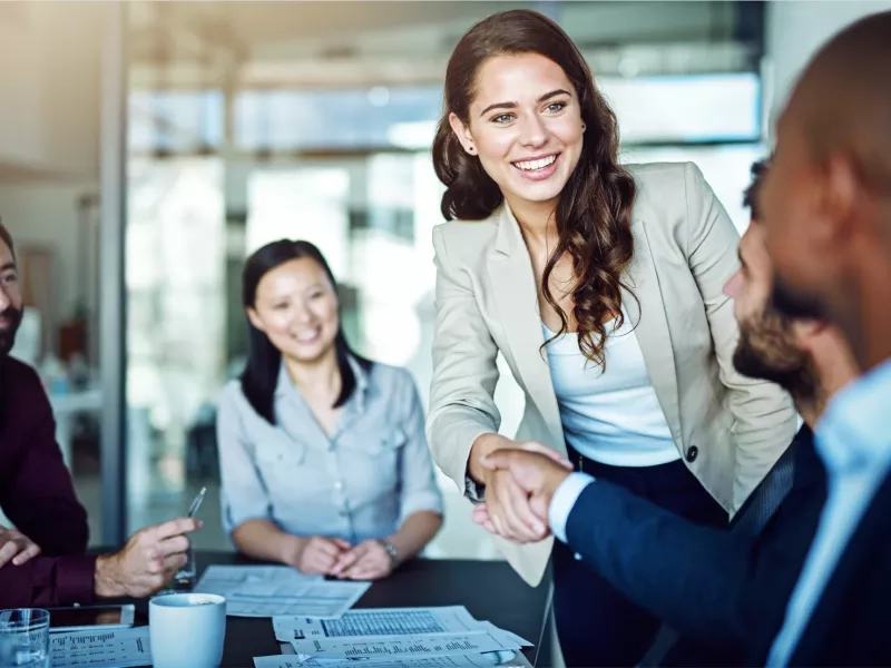 woman shaking hands